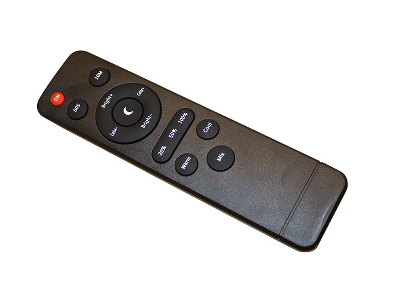 Remote control for the Magno Lumina Max Lamp. The remote is black with a red power button at the top and various circular buttons to adjust brightness levels (20%, 50%, 100%), color temperature settings (Warm, Cool, and Mix), and timers (10M and 60S). A central button allows users to fine-tune brightness and color settings. Designed for easy use, it helps people with low vision customize the lamp's lighting for an optimal viewing environment.