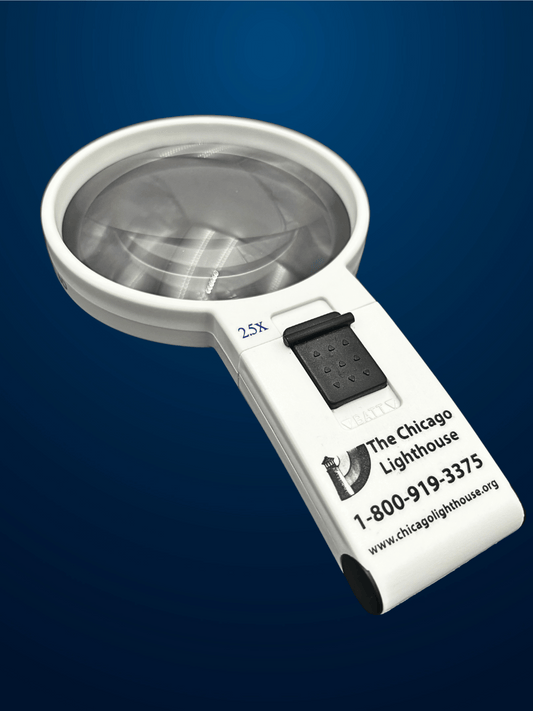 A white 2.5X handheld magnifier with black switch and chicago lighthouse logo