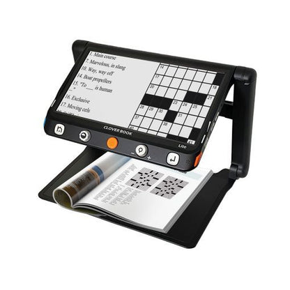 CloverBook Plus; 12.5″ FHD foldable video magnifier with touchscreen navigation and distance camera with an enlarged magazine of a crossword puzzle on it's desplay.