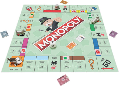 Giant onopoly Board game showing large medal piecws, large colorful playing cards, and colorful paper money.